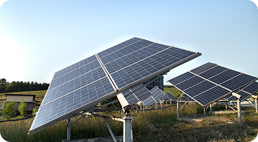 Renewable energy solutions UK: solar panels installed on a rooftop under a clear sky.